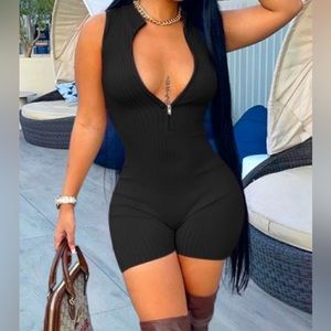 Solid zipper up sleeveless romper